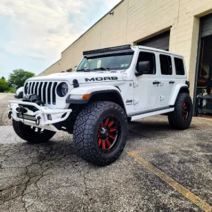 A white moab jeep